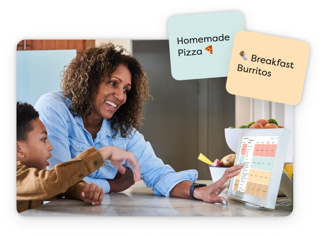 Family adding meals like Homemade Pizza and Breakfast Burritos to the Skylight Calendar's Meal Plan view.